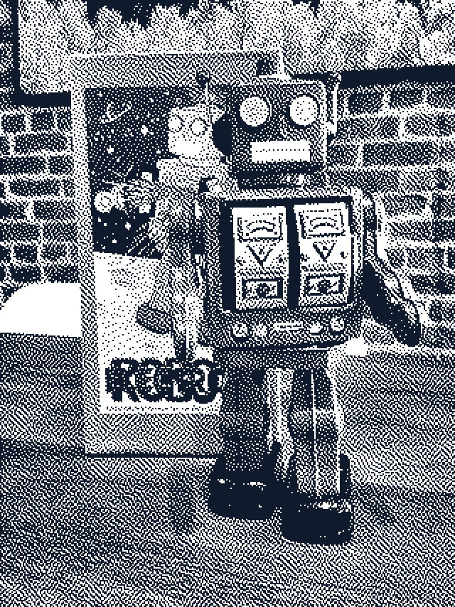 1-bit image: A Chango mailer: a wind-up robot and a printed box, 2013.